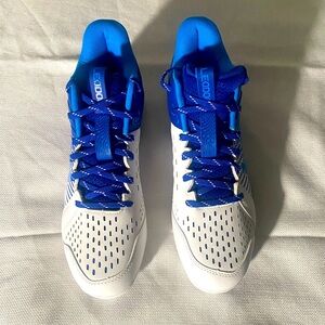 Blue and White Under Armour Turf Cleats Size M9
